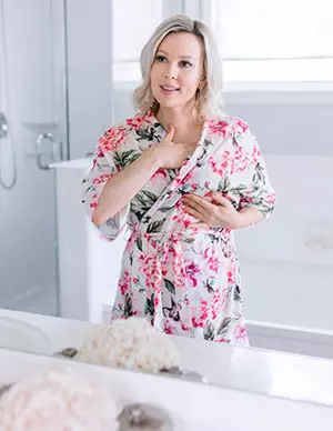 Anna Crollman in front of mirror