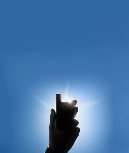 New product blacked out on blue background