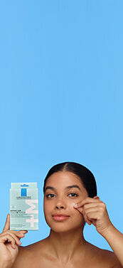 Woman using Effaclar Duo+M Multi-Target Blemish Patches