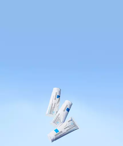 La Roche-Posay Cicaplast Balm B5+ on a blue background