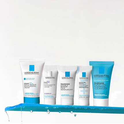 Deluxe sample bottles on white background
