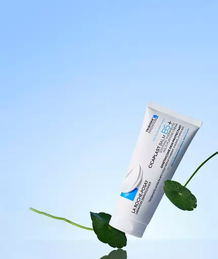 Best selling La Roche Posay Cicaplast Balm B5+ on blue background with leaves