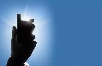 New products bottle blacked out on a blue background